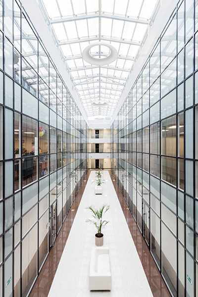 office corridor with glass with floor to ceiling glass windows virginia beach va